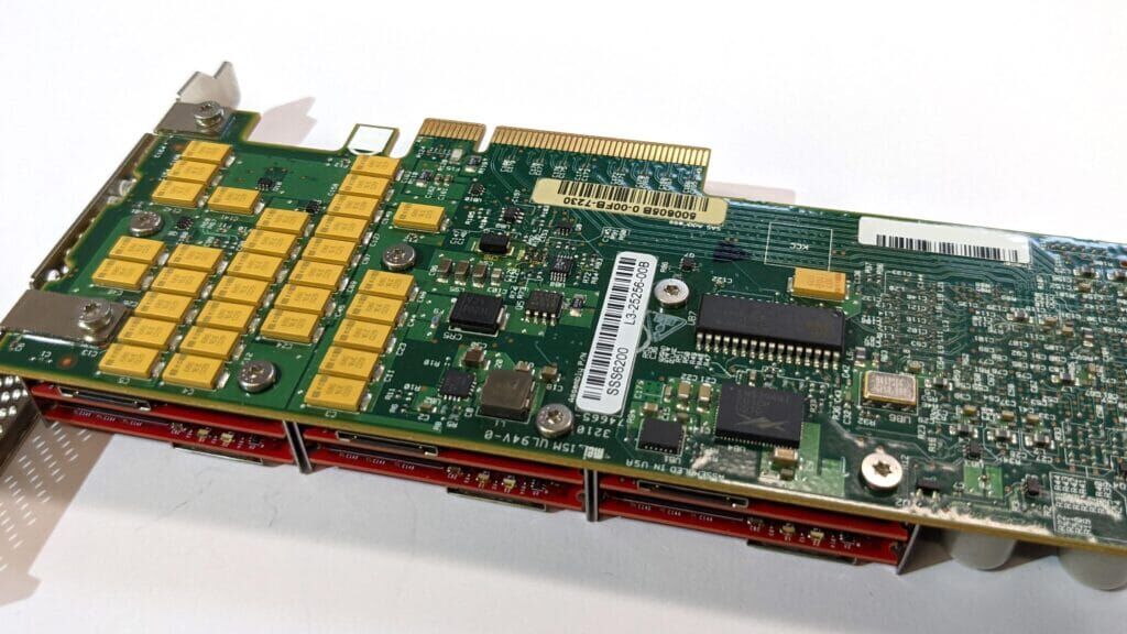 A controller in a Seagate enterprise SSD, surrounded by (yellow) tantalum supercapacitors to protect against power failures.